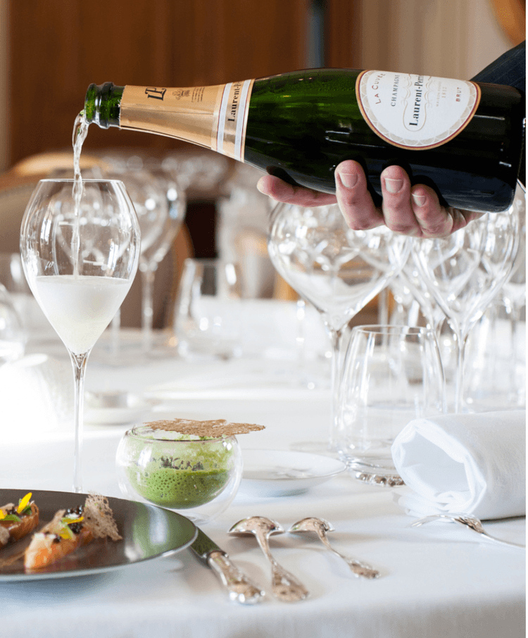 A champagne bottle being served